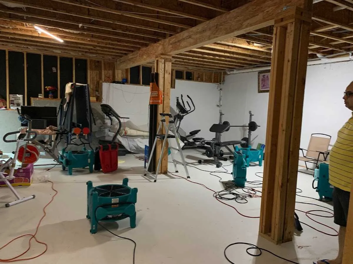 Basement drying equipment setup for Contents Cleaning & Restoration in Corning